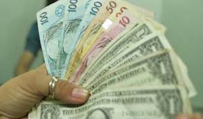 dinheiro - Após anúncio de Janot sobre delação da JBS, dólar cai e bolsa sobe